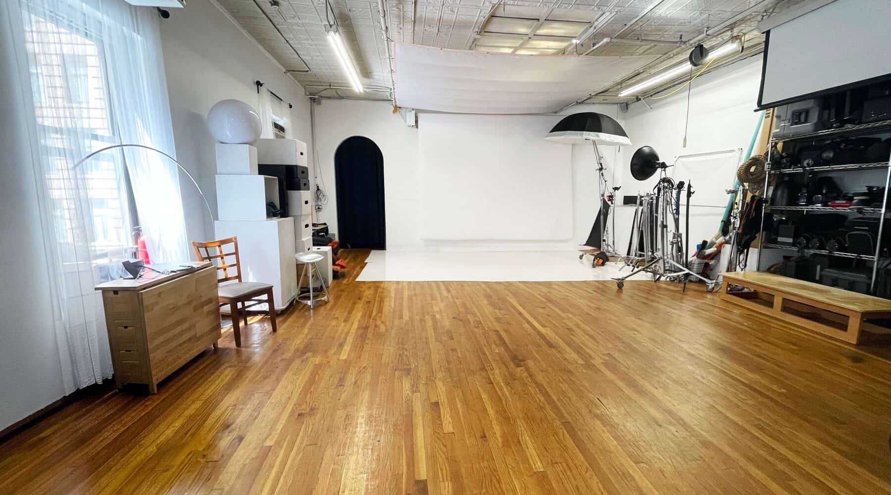 Open Manhattan photo studio rental space with hardwood floors and large shooting area
